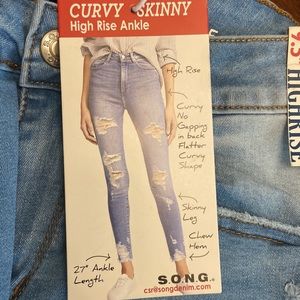 Never worn all tags attached high rise skinny ankle jeans
